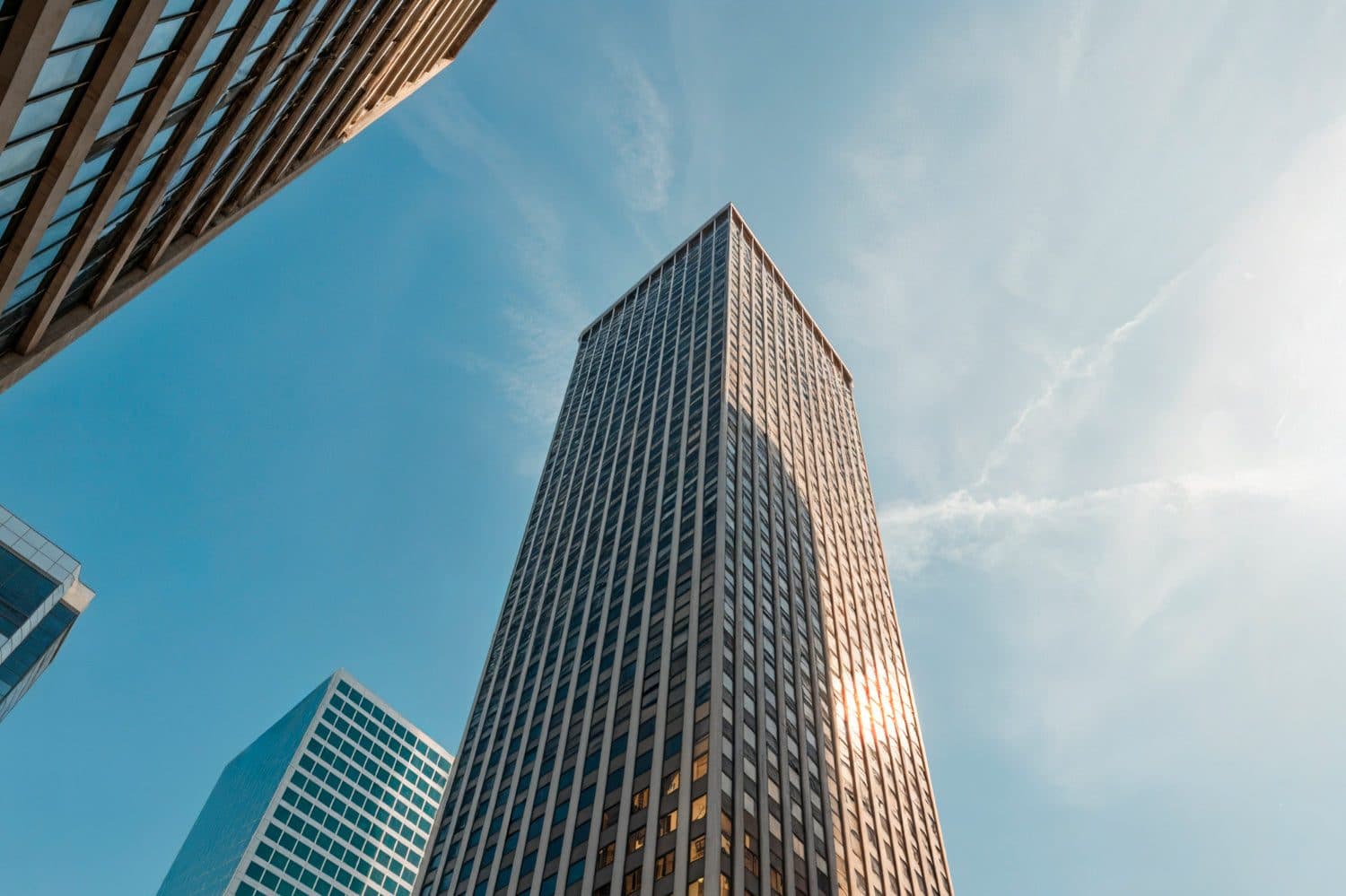 Glass towers against a clear sky